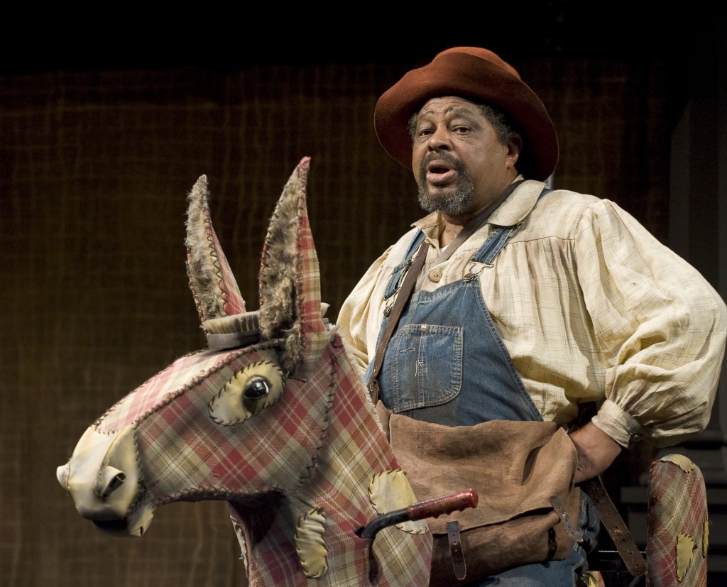 Josiah Phillips as Sancha Panza, with his devoted donkey, in "Don Quixote." Photo: David Cooper/Oregon Shakespeare Festival/2009