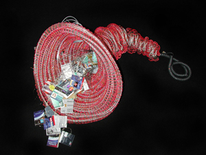 A Bonnie Meltzer mixed-media sculpture with cut-up redit cards in a cornucopia. 