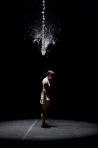 A cascade of water soaks Andrea Parsons in Sarah Slipper's "Not I." Photo: BLAINE T. COVERT