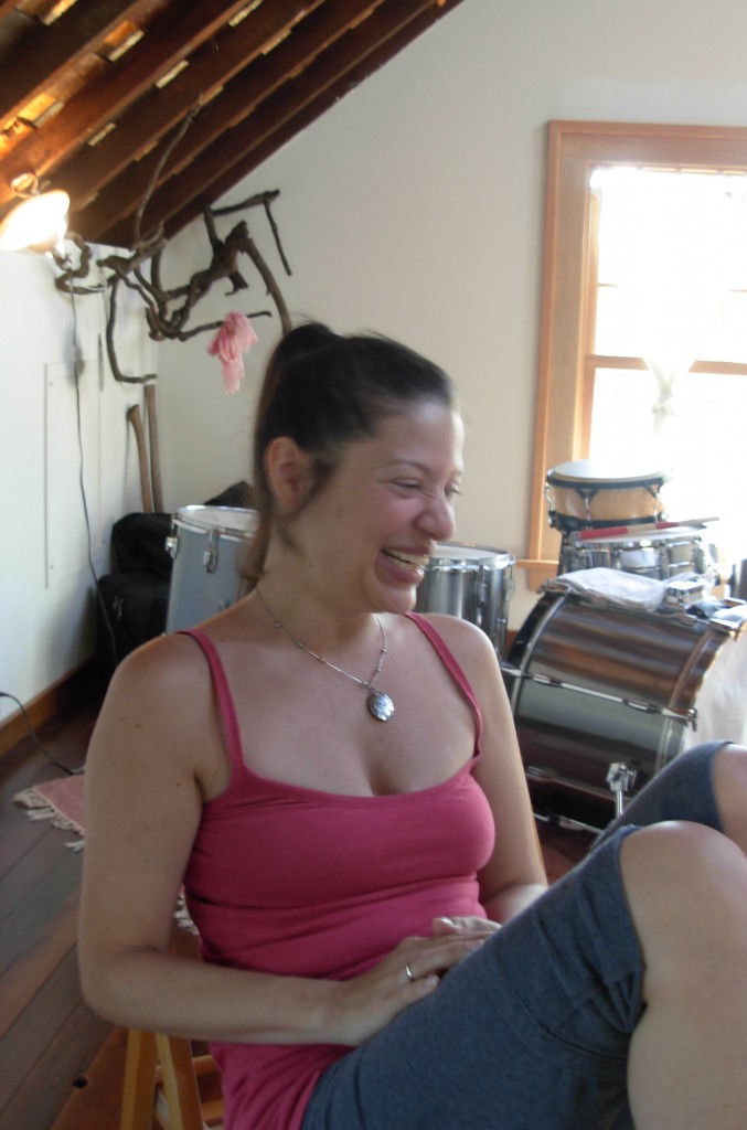 Christine Calfas in her attic studio, preparing to WHOOP.