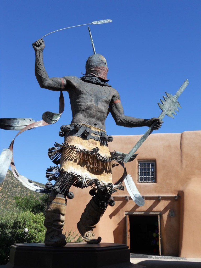 "Apache Mountain Spirit Dancer," Craig Dan Goseyun, San Carlos Apache. Museum Hill Plaza, Santa Fe; bronze; 1995.