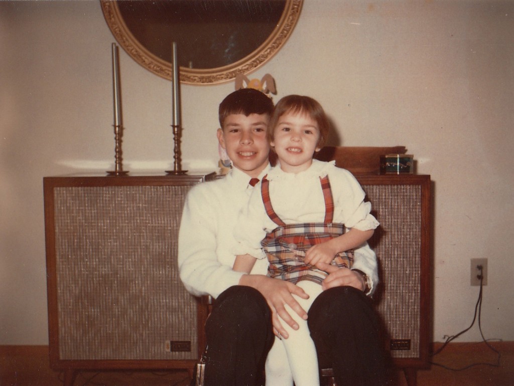 Looks like we were dressed for Easter. Remember when we could still fit in the miniature rocking chair?