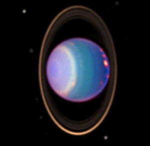 An image from the Hubble telescope in 1998 shows bands, rings and moons around Uranus. Wikimedia Commons