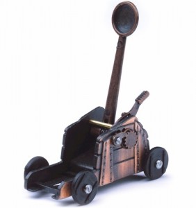 A cheap die-cast Roman catapult with a built-in pencil sharpener costs only a few bucks and can be found at any tourist trap in London, but it earned Mrs. Scatter enormous clout with her catapult-loving son.