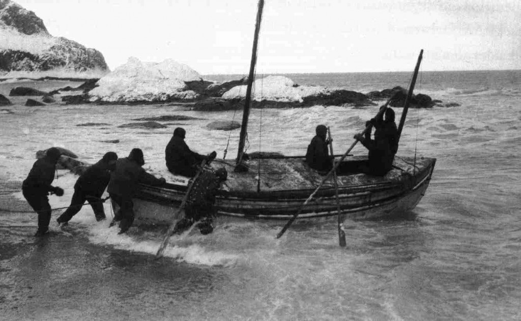 Launch of the lifeboat James Caird from the shore of Elephant Island, April 24, 1916. Published in Shackleton's book, "South," William Heinemann, London 1919. Photo is probably by Frank Hurley, the expedition's photographer. Wikimedia Commons