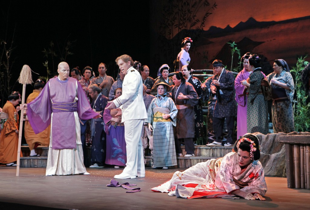 Kelly Kaduce as Cio-Cio-San in "Madame Butterfly," with Gustav Andreassen (left) as the Bonze and Roger Honeywell as Pinkerton. Â©Portland Opera/Cory Weaver.